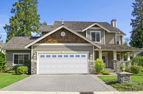 A home with a newly installed garage door.